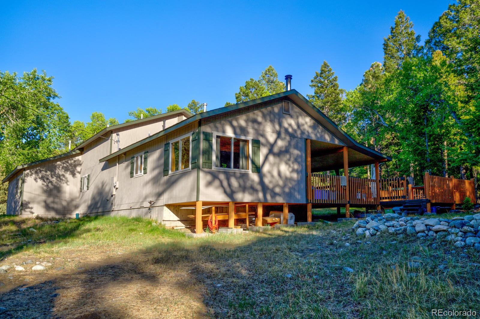 203 Hampton Run Road Mosca, CO 81146 - Photo 6 of 33 front view of a house with a yard