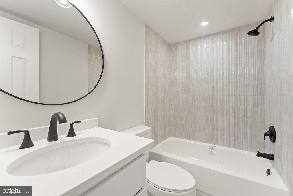 10022 Kentucky Springs Road Mineral, VA 23117 - Photo 19 of 31 a bathroom with a sink and a mirror