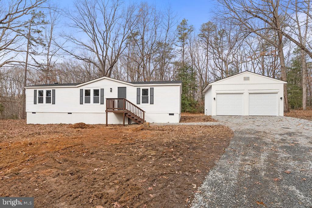 10022 Kentucky Springs Road Mineral, VA 23117 - Photo 25 of 31 a front view of a house with a yard