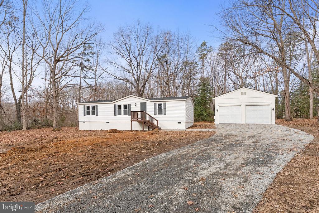 10022 Kentucky Springs Road Mineral, VA 23117 - Photo 26 of 31 a view of a house with a snow in the yard