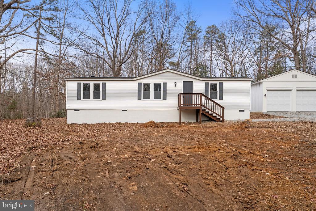 10022 Kentucky Springs Road Mineral, VA 23117 - Photo 28 of 31 a front view of a house with a yard