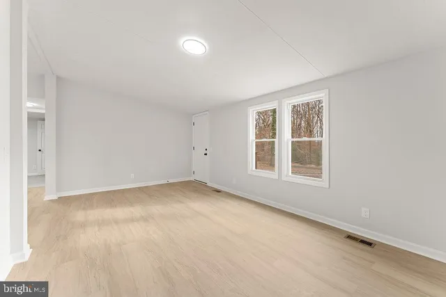 an empty room with a window