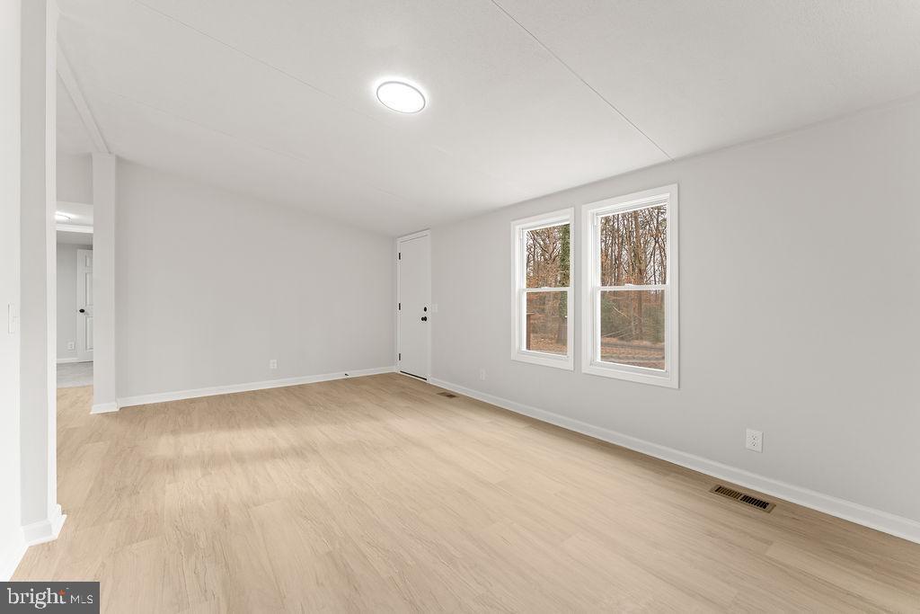 10022 Kentucky Springs Road Mineral, VA 23117 - Photo 5 of 31 an empty room with a window