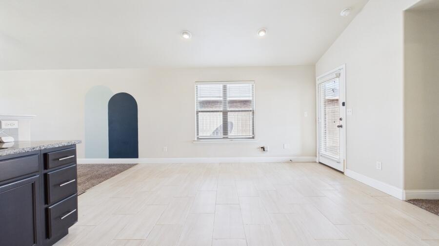 3707 Rochester Avenue Lubbock, TX 79407 - Photo 18 of 40 a view of an empty room with a window