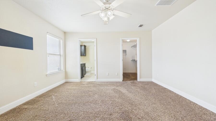 3707 Rochester Avenue Lubbock, TX 79407 - Photo 21 of 40 a view of an empty room with a window