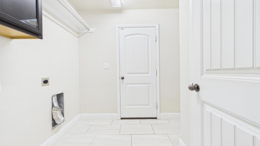 3707 Rochester Avenue Lubbock, TX 79407 - Photo 27 of 40 a view of a closet from a hallway