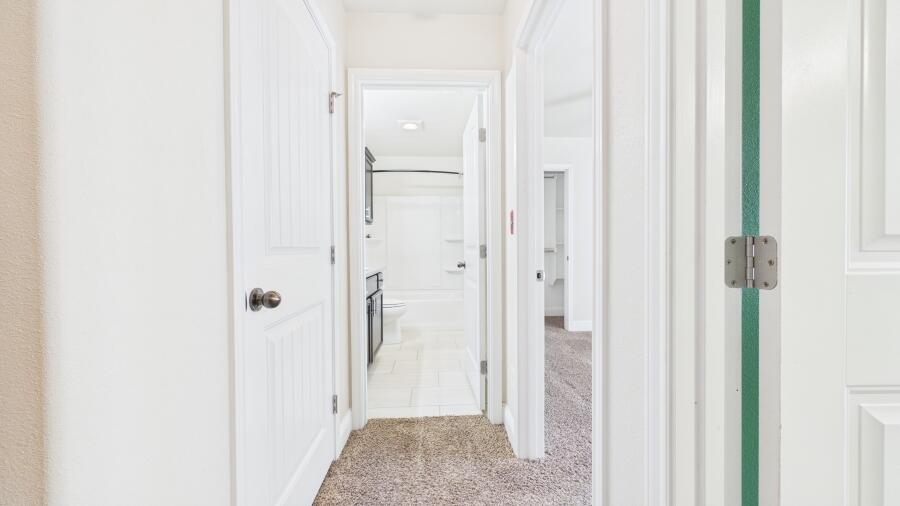 3707 Rochester Avenue Lubbock, TX 79407 - Photo 29 of 40 a view of a bathroom with a glass shower door