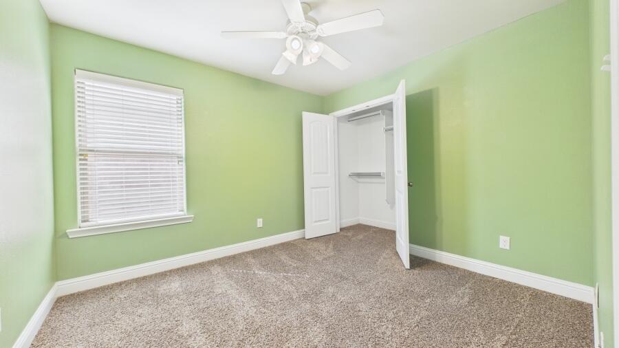 3707 Rochester Avenue Lubbock, TX 79407 - Photo 31 of 40 a view of an empty room with window and fan