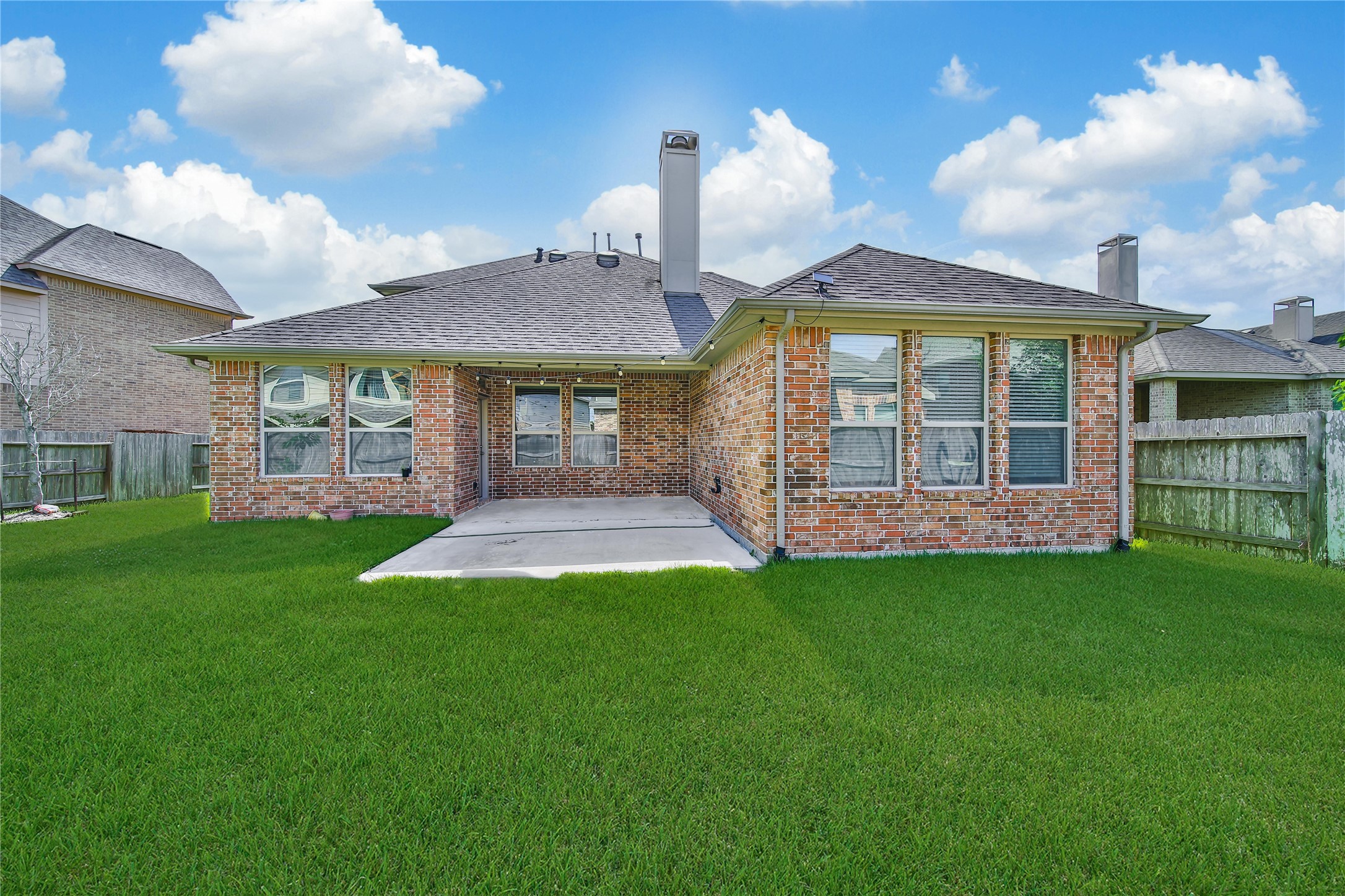 3910 Lupin Bush Lane Manvel, TX 77578 - Photo 25 of 30 a front view of a house with a garden