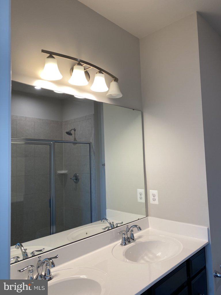 531 View Point Way Fredericksburg, VA 22405 - Photo 3 of 36 Sleek dual-sink bathroom oasis.