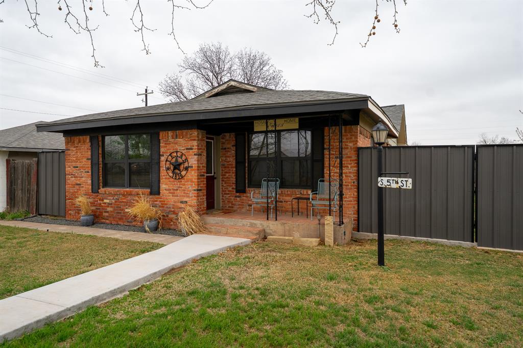 455 5th Street Hawley, TX 79525 - Photo 2 of 37 a view of a house with backyard and porch