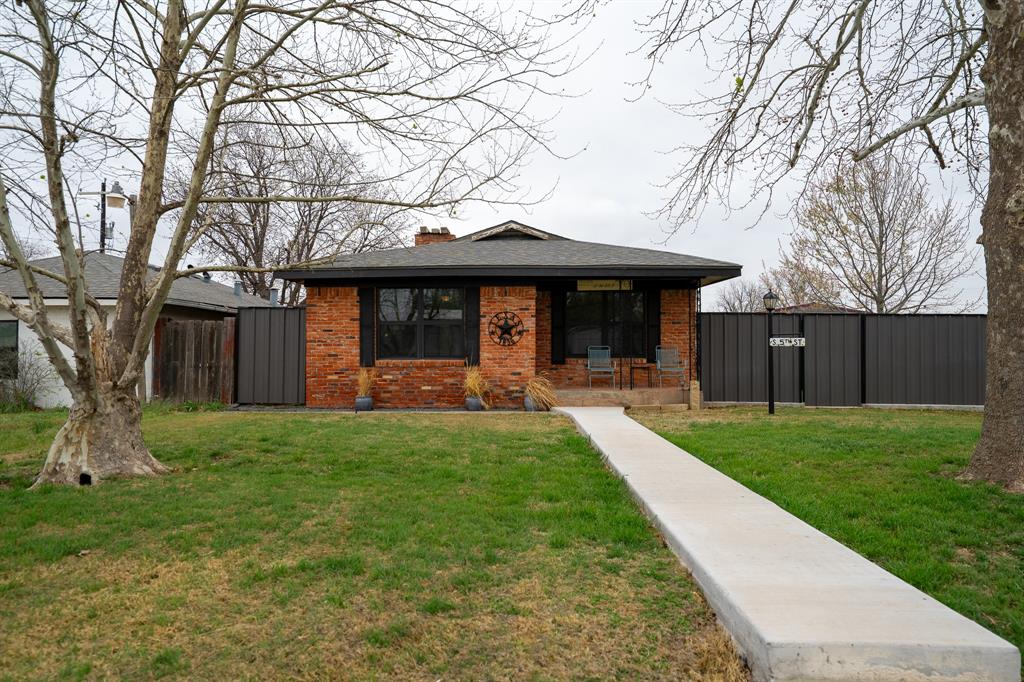 455 5th Street Hawley, TX 79525 - Photo 22 of 37 a view of a house with backyard and a tree