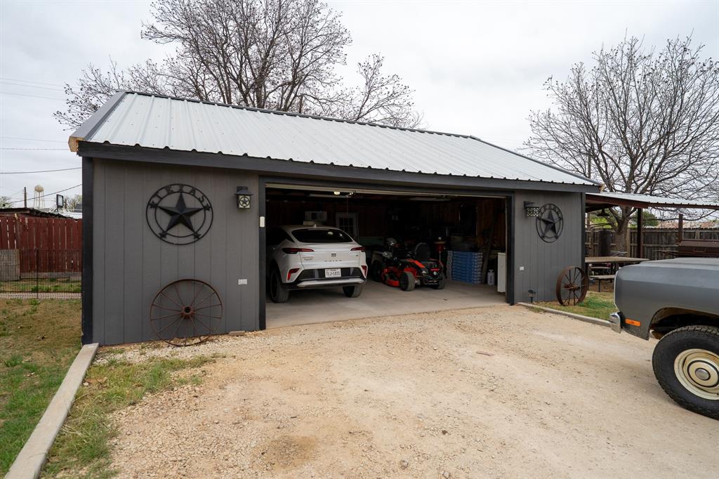 455 5th Street Hawley, TX 79525 - Photo 27 of 37 a view of a car parked in garage