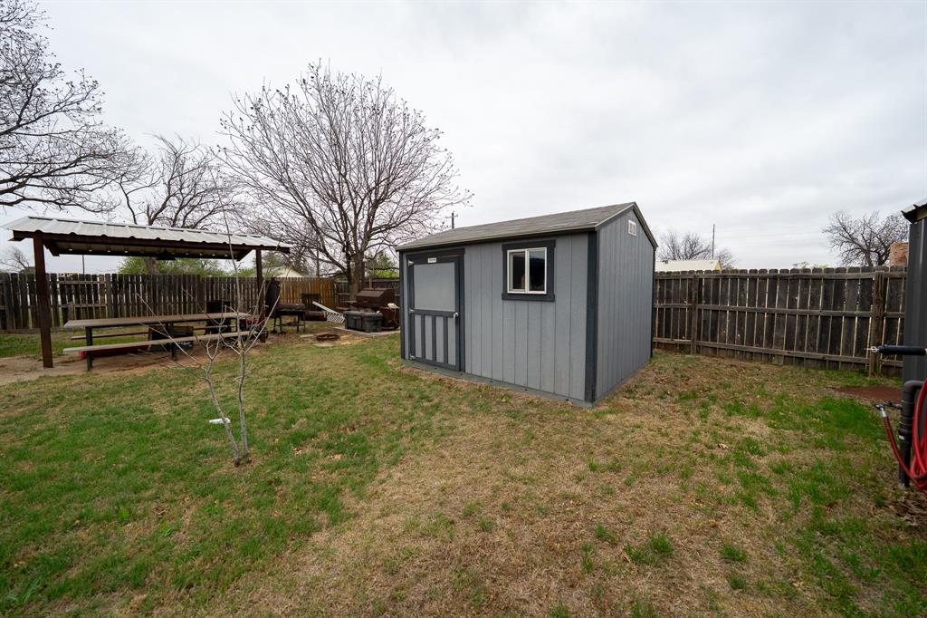 455 5th Street Hawley, TX 79525 - Photo 30 of 37 a view of a backyard with a garden