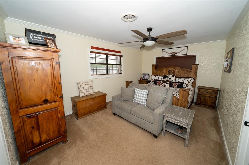 455 5th Street Hawley, TX 79525 - Photo 7 of 37 a living room with furniture and a window