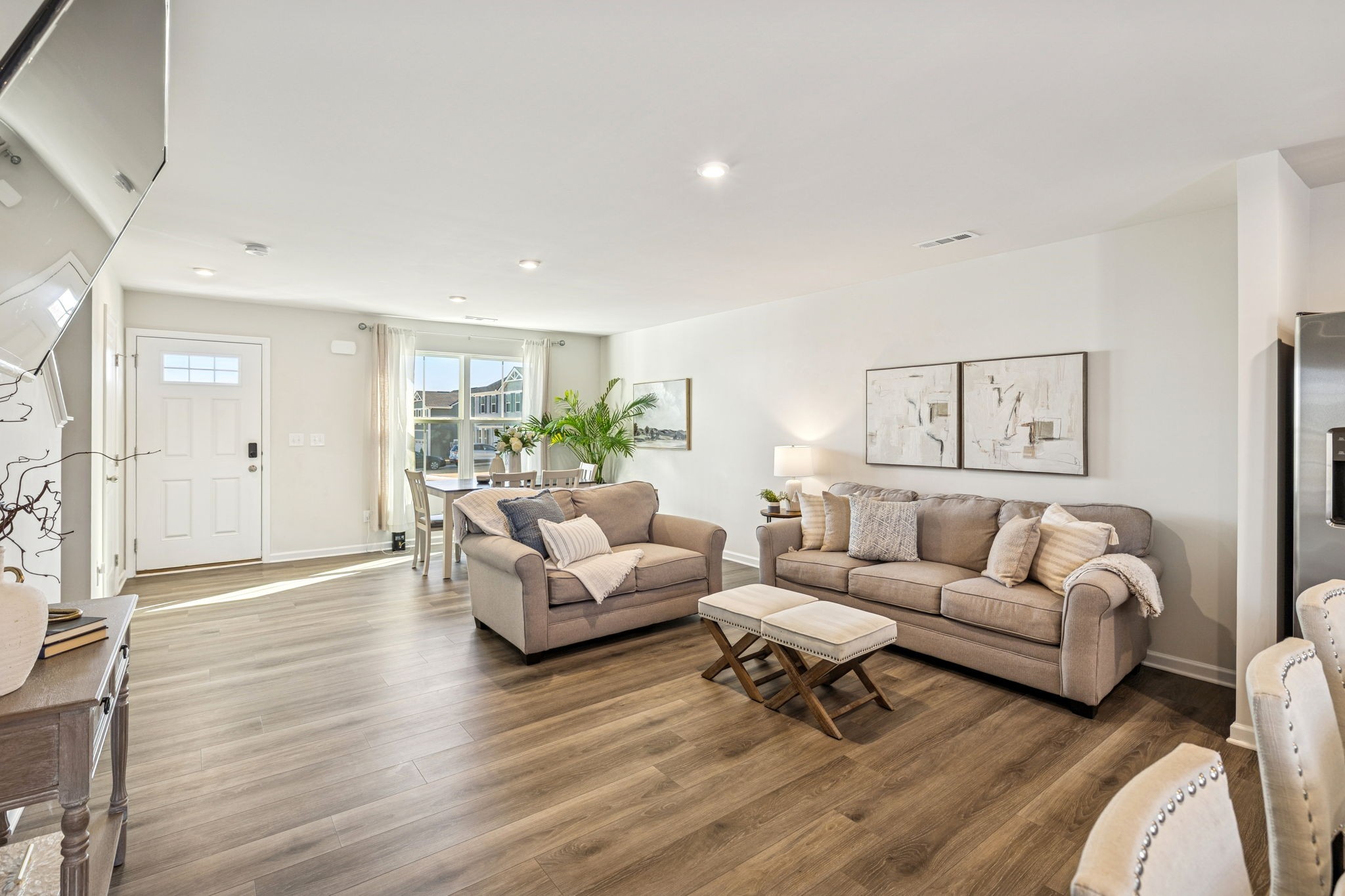 2116 Somersby Trail Spring Hill, TN 37174 - Photo 13 of 45 a living room with furniture and a wooden floor