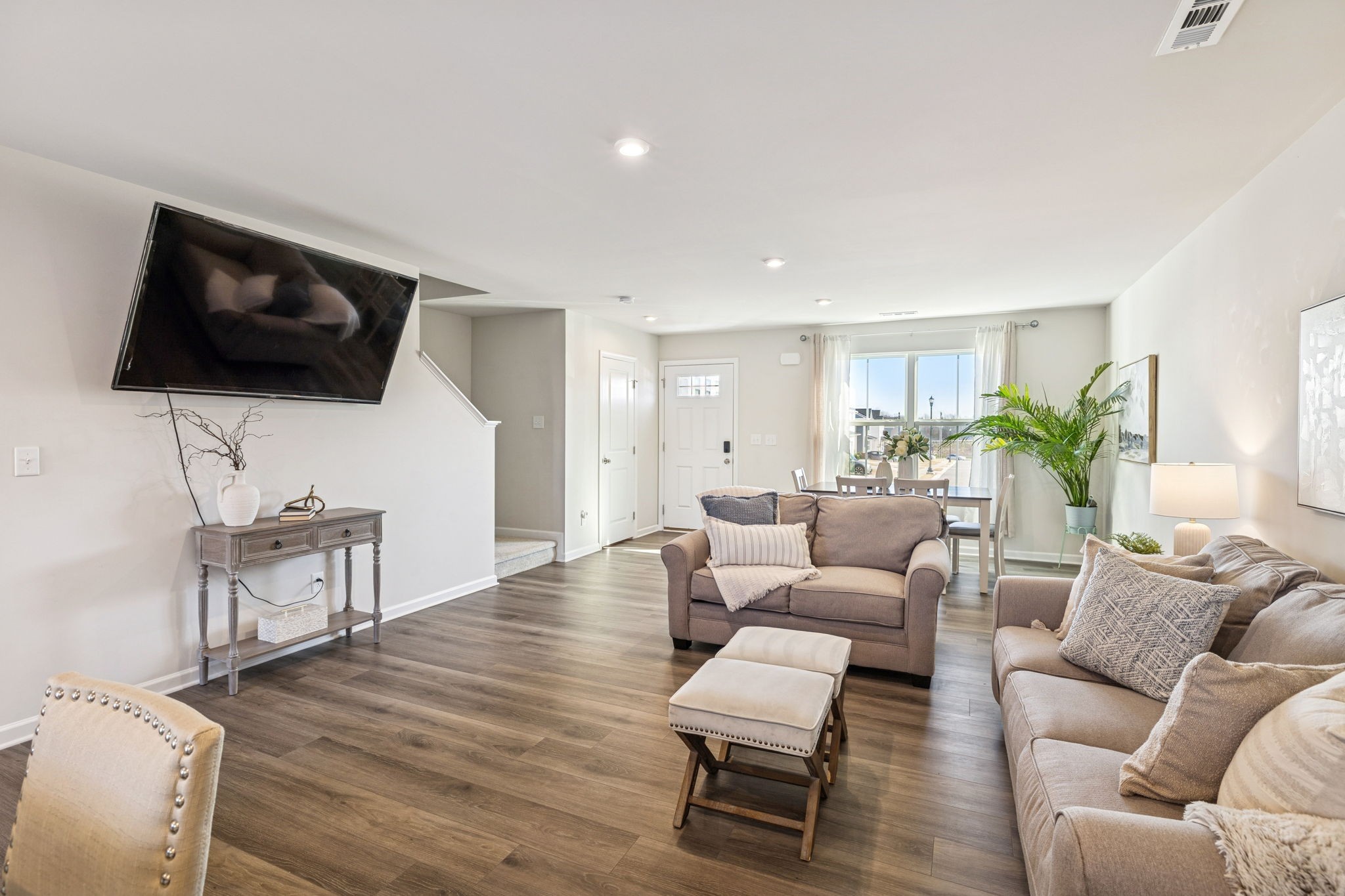 2116 Somersby Trail Spring Hill, TN 37174 - Photo 16 of 45 a living room with furniture and a flat screen tv