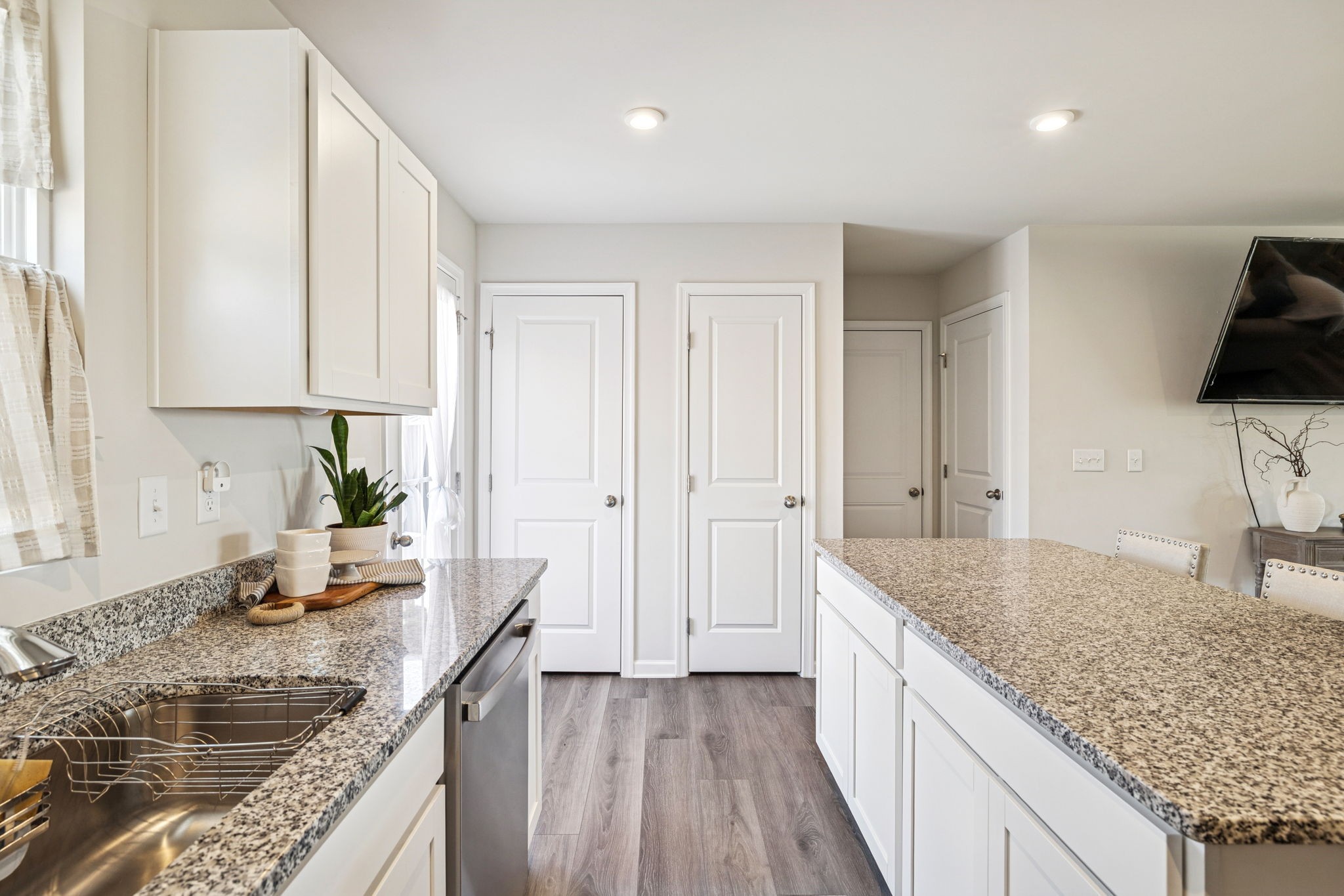 2116 Somersby Trail Spring Hill, TN 37174 - Photo 17 of 45 a kitchen with stainless steel appliances granite countertop a sink stove and refrigerator