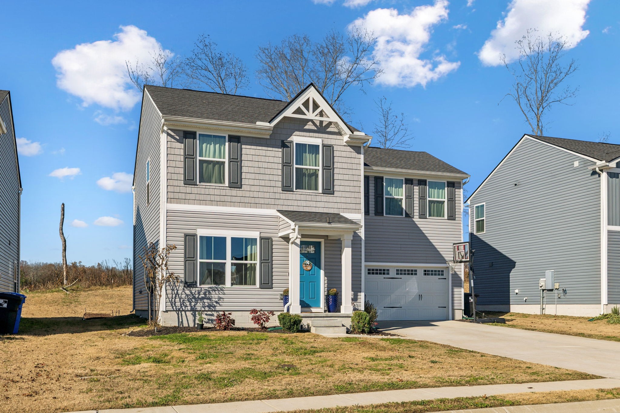 2116 Somersby Trail Spring Hill, TN 37174 - Photo 2 of 45 a front view of a house with a yard
