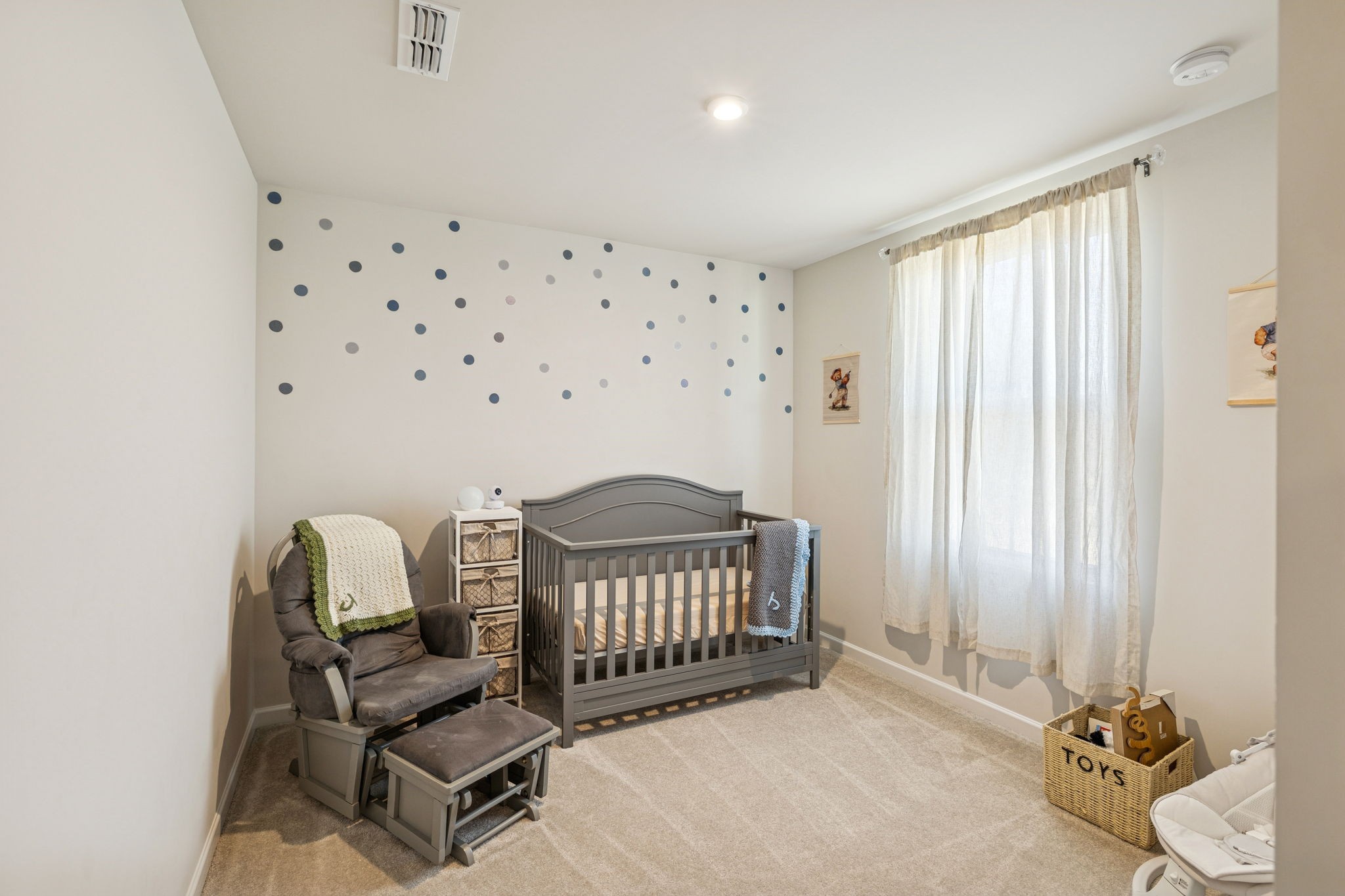 2116 Somersby Trail Spring Hill, TN 37174 - Photo 23 of 45 a bedroom with furniture and a window