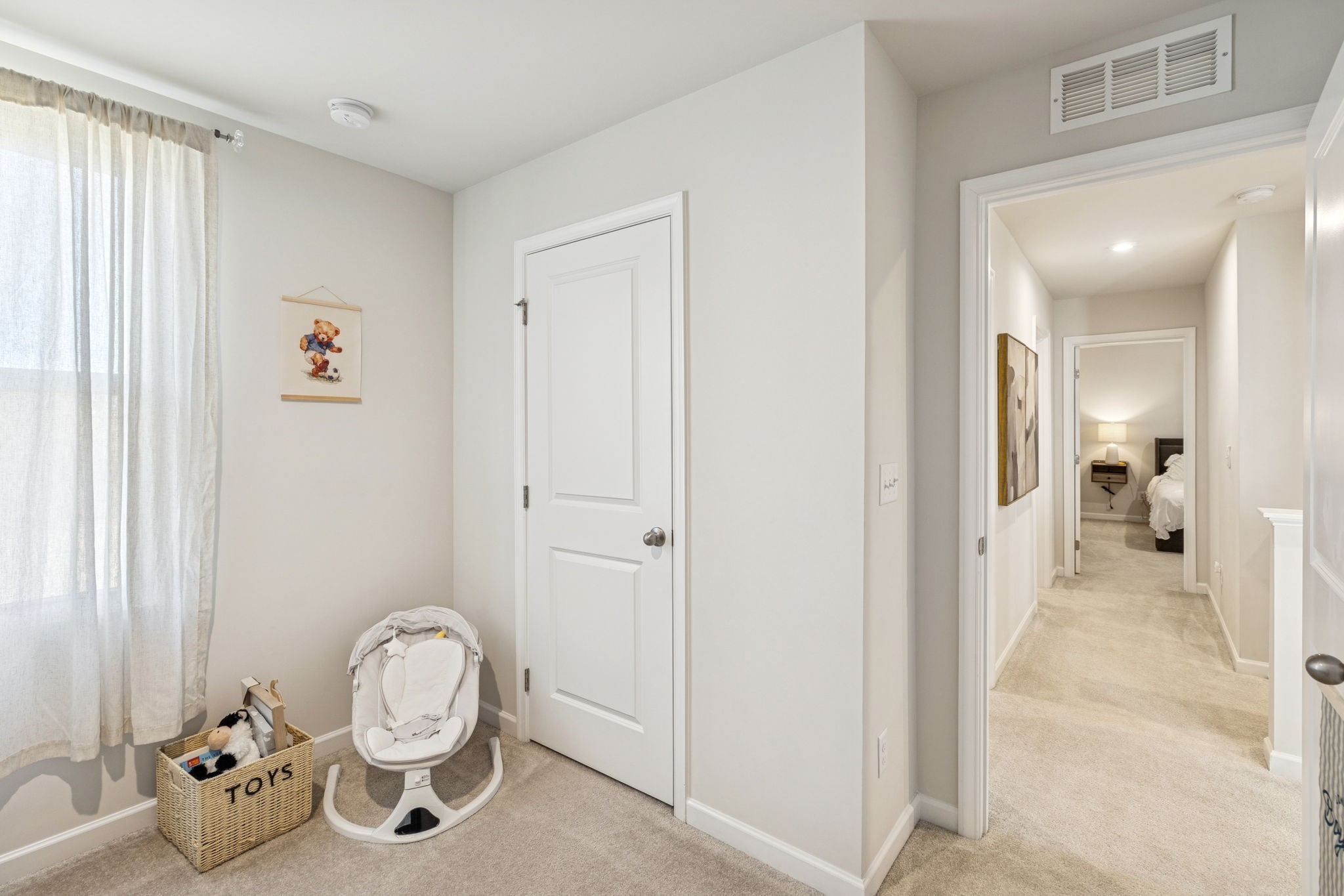 2116 Somersby Trail Spring Hill, TN 37174 - Photo 24 of 45 a view of a livingroom with furniture and a mirror