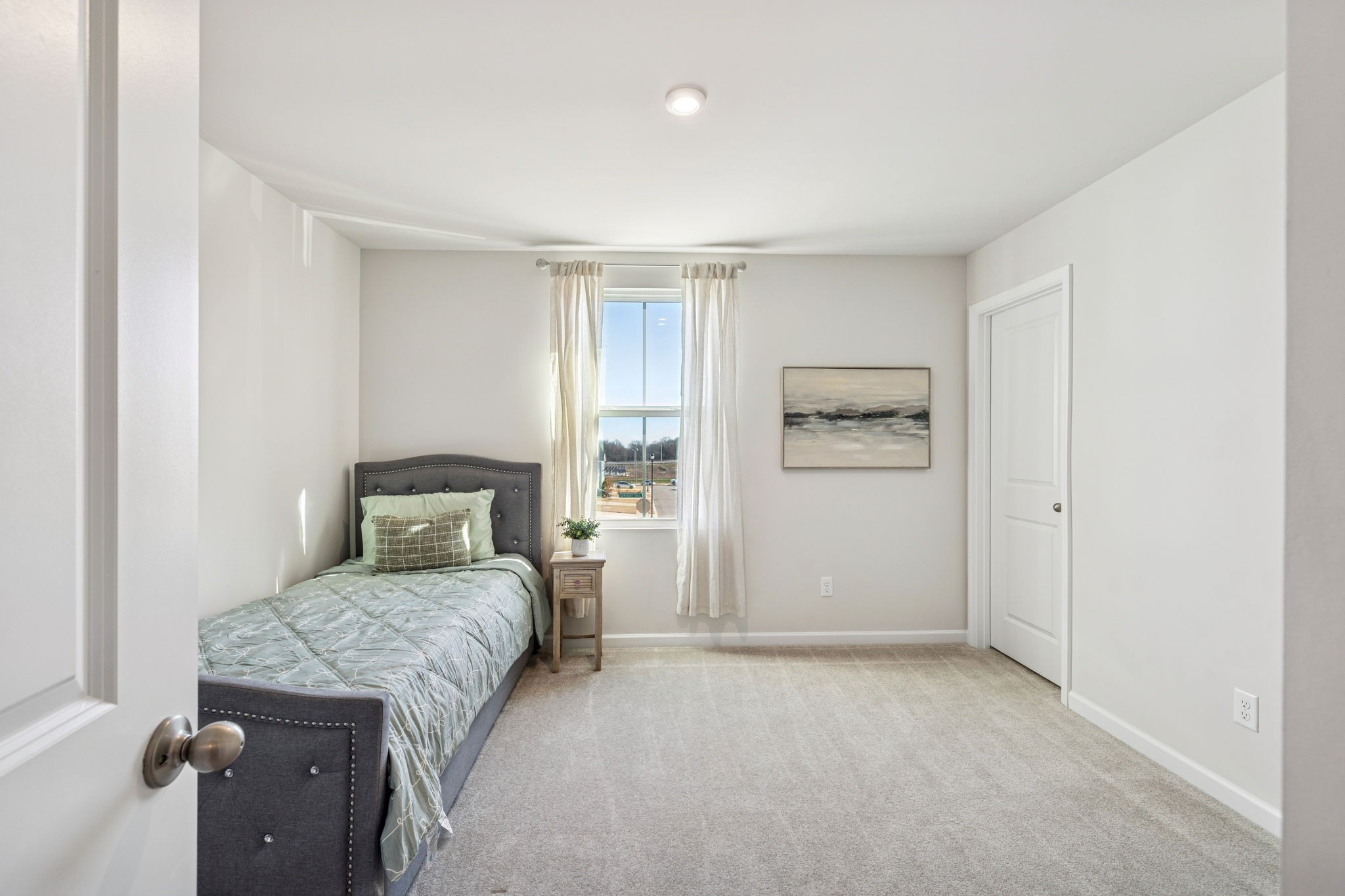 2116 Somersby Trail Spring Hill, TN 37174 - Photo 28 of 45 a bedroom with a bed and closet