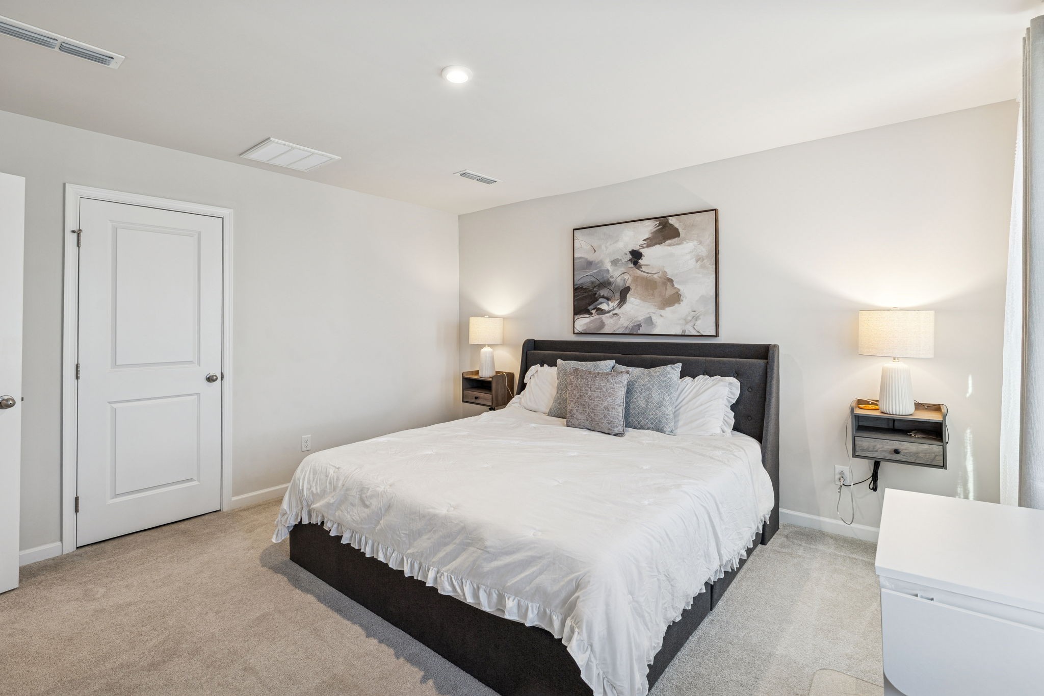 2116 Somersby Trail Spring Hill, TN 37174 - Photo 34 of 45 a bedroom with a bed and a painting on the wall