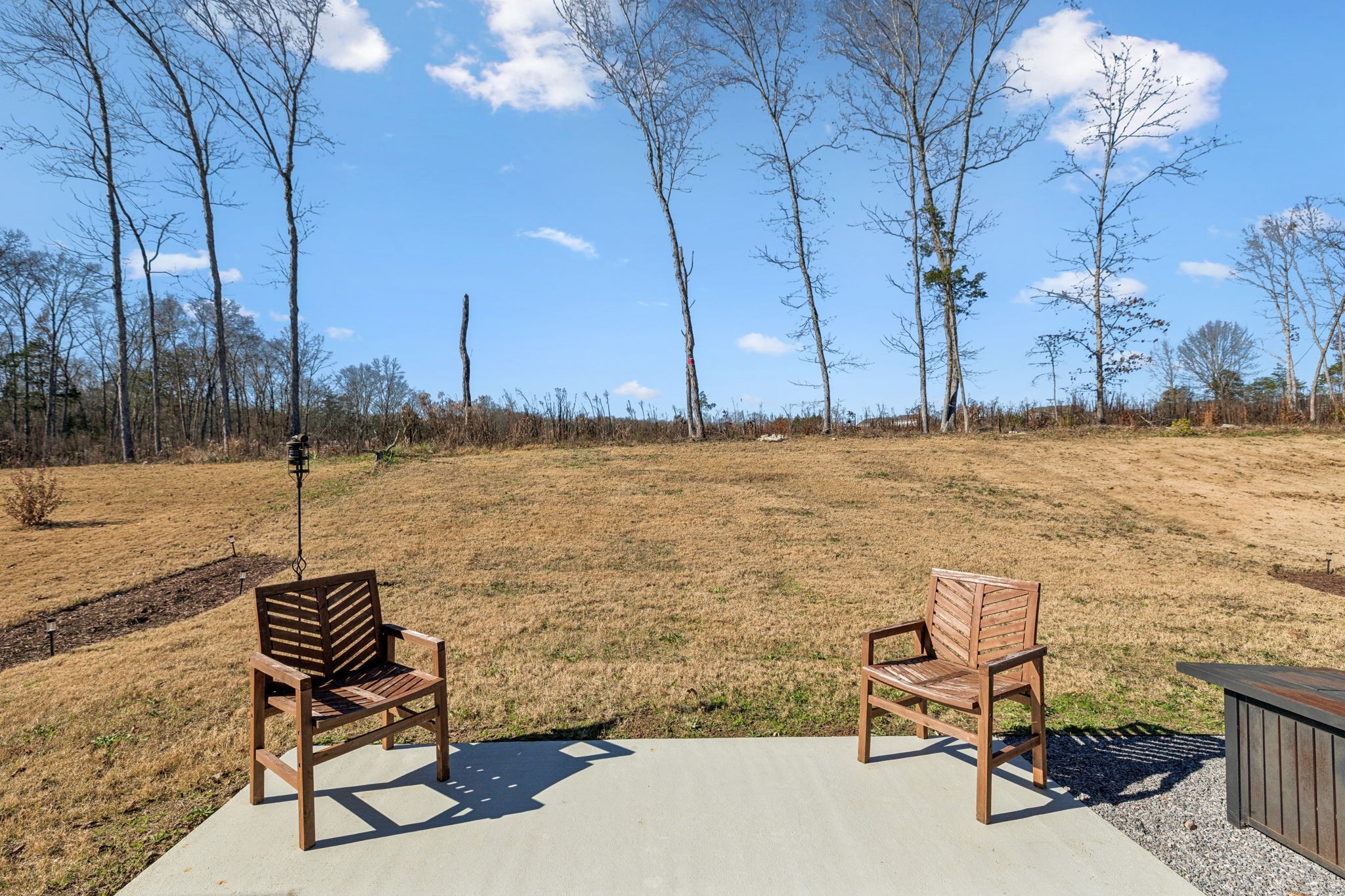 2116 Somersby Trail Spring Hill, TN 37174 - Photo 38 of 45 a view of a lake with chairs