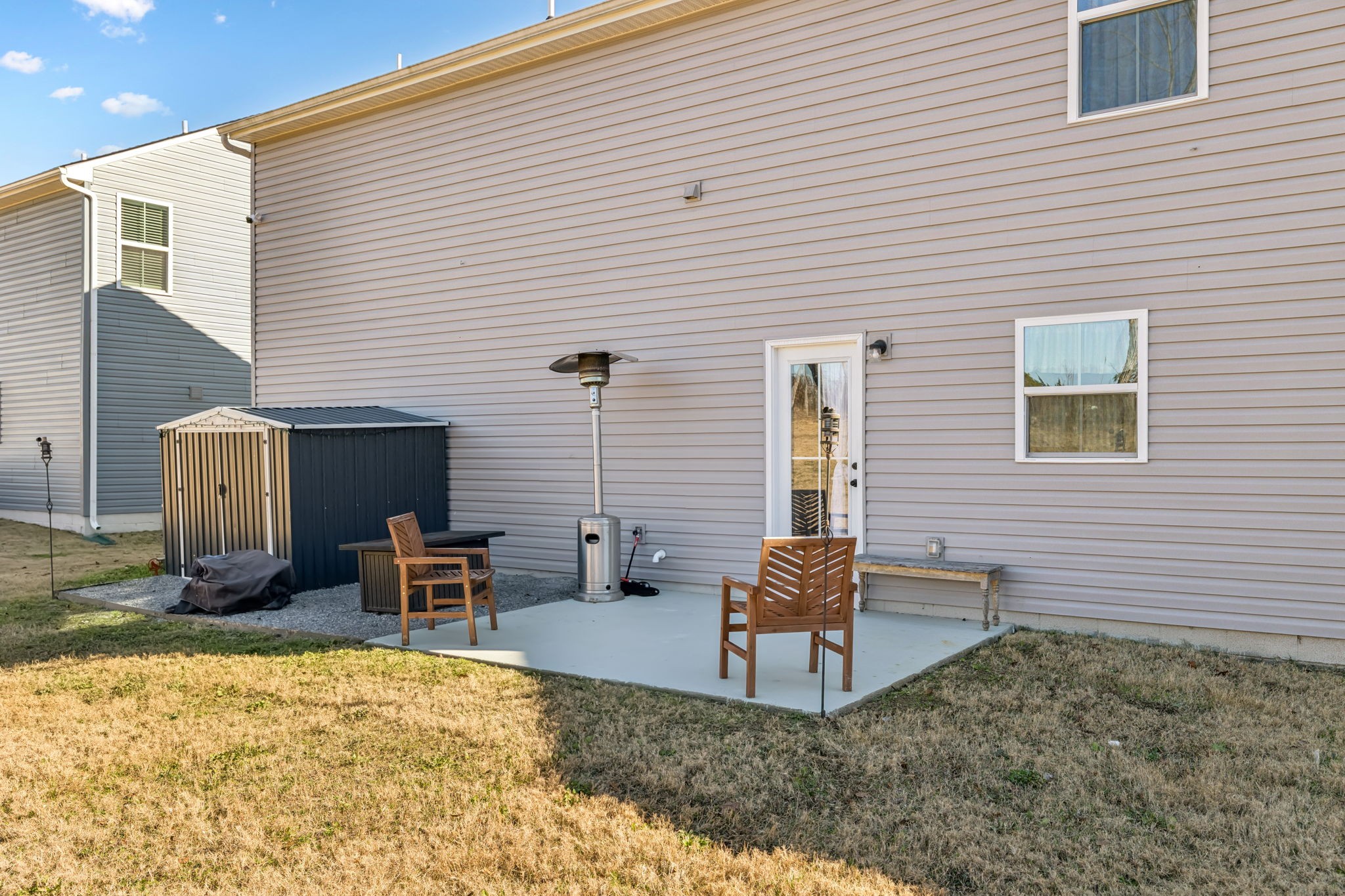 2116 Somersby Trail Spring Hill, TN 37174 - Photo 44 of 45 a backyard of a house with seating space
