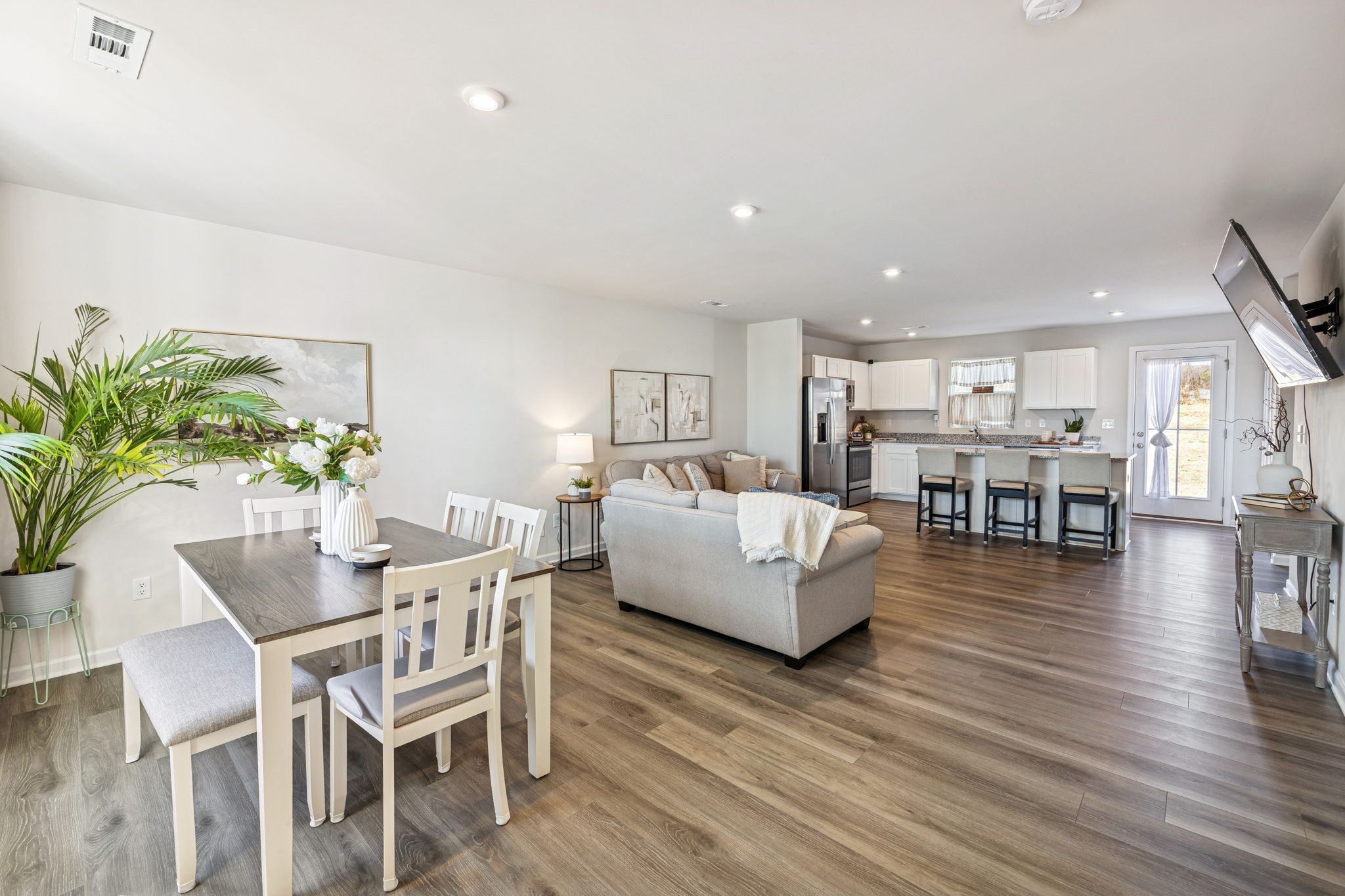 2116 Somersby Trail Spring Hill, TN 37174 - Photo 6 of 45 a living room with furniture and a wooden floor