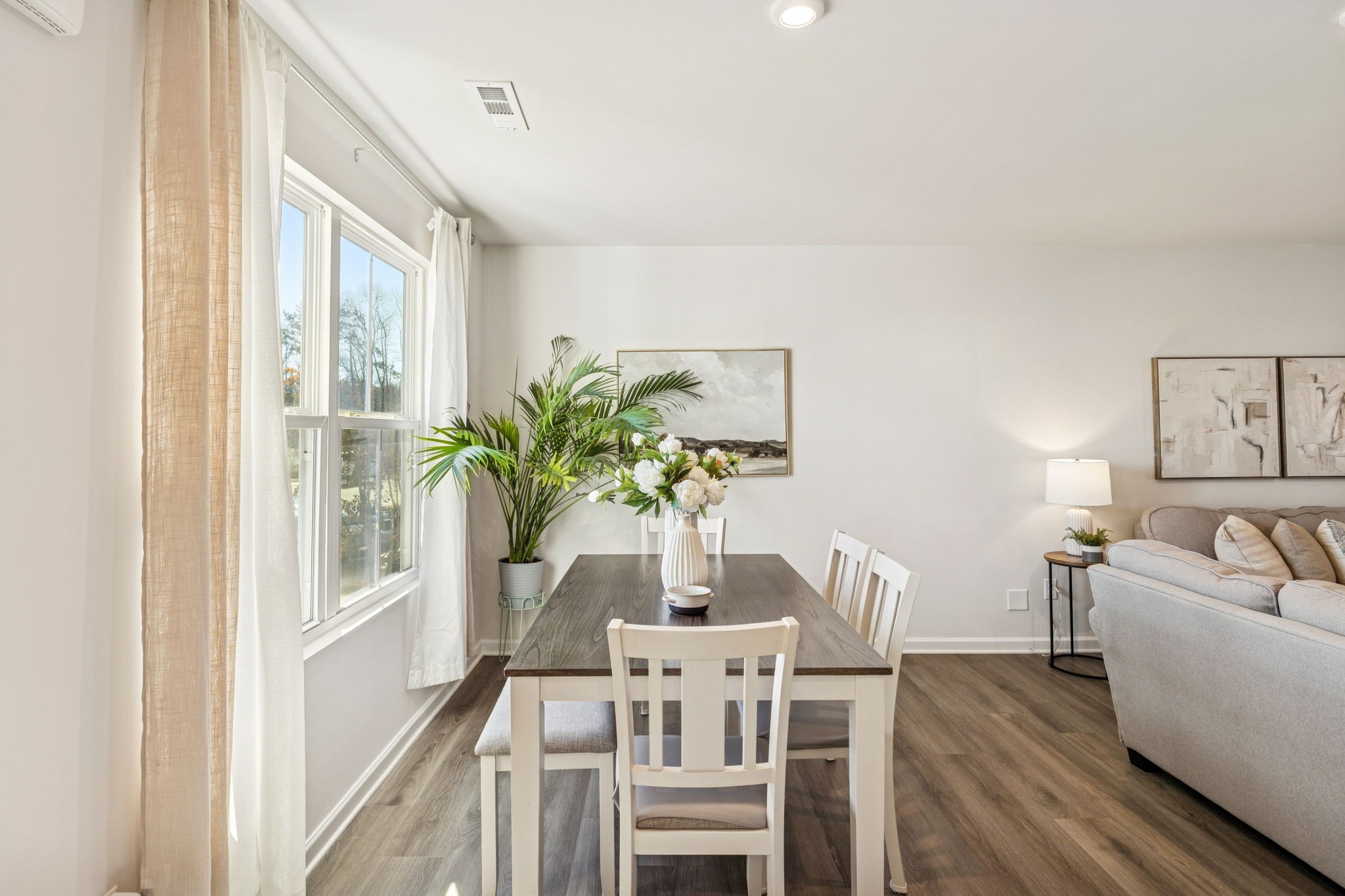 2116 Somersby Trail Spring Hill, TN 37174 - Photo 7 of 45 a view of a dining room with furniture window and wooden floor