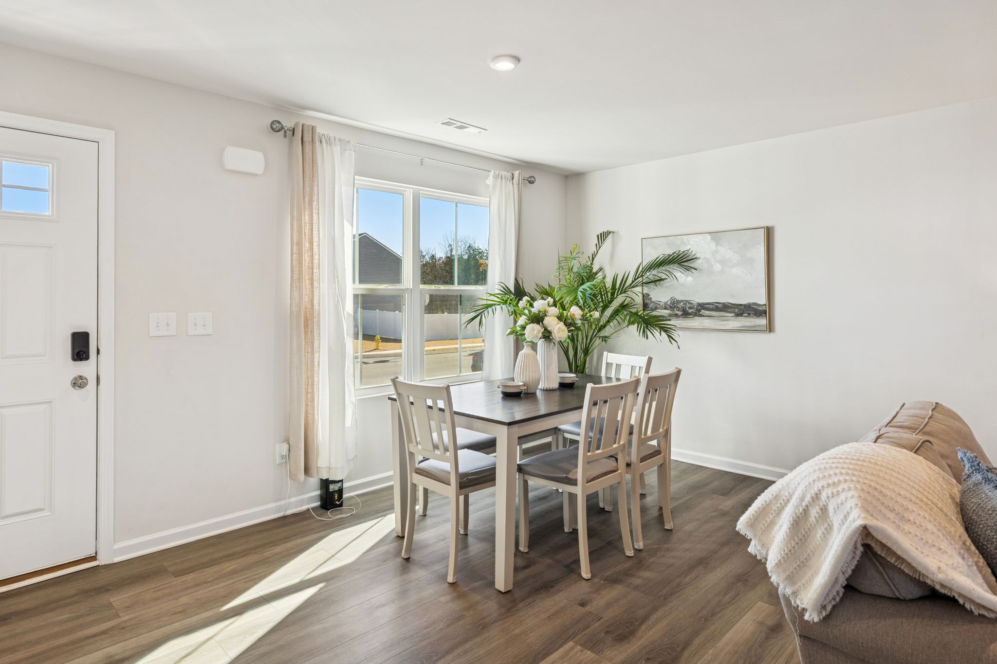 2116 Somersby Trail Spring Hill, TN 37174 - Photo 8 of 45 a view of a dining room with furniture and wooden floor