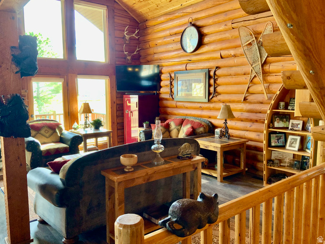 76 Highway 118 Monroe, UT 84754 - Photo 32 of 76 Living area featuring wood finished floors, wooden ceiling, high vaulted ceiling, and rustic walls