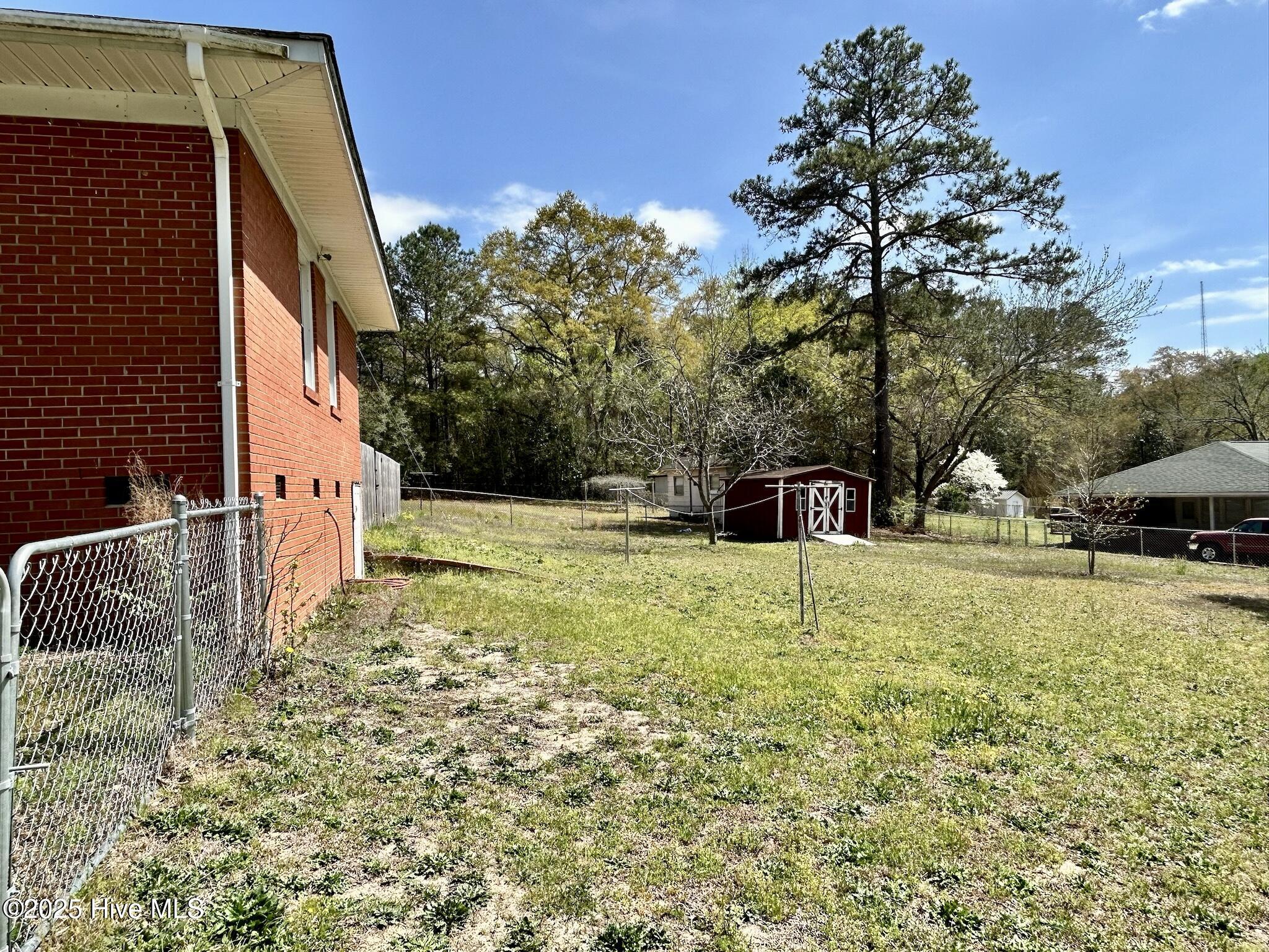 158 County Home Road Rockingham, NC 28379 - Photo 26 of 44 fenced in backyard