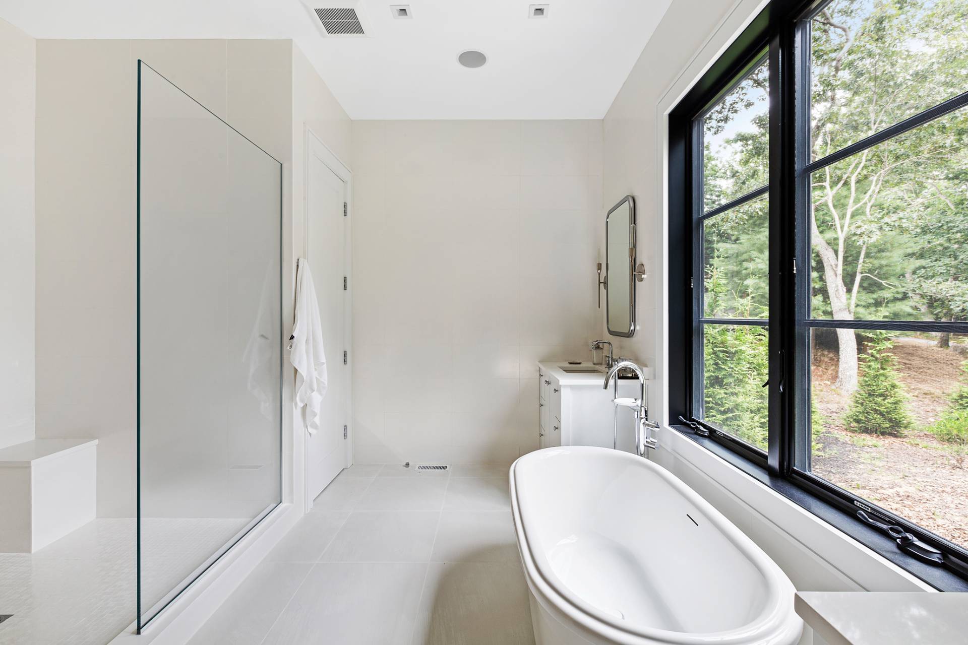 8 Crows Nest Lane East Hampton, NY 11937 - Photo 12 of 33 a bathroom with a sink toilet and shower