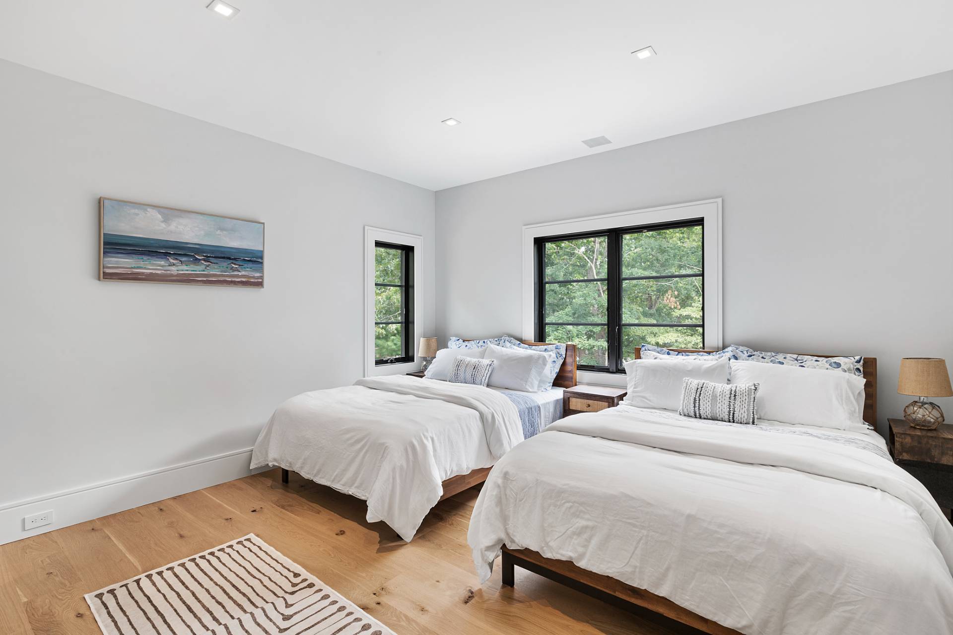 8 Crows Nest Lane East Hampton, NY 11937 - Photo 19 of 33 a bedroom with two beds and a window