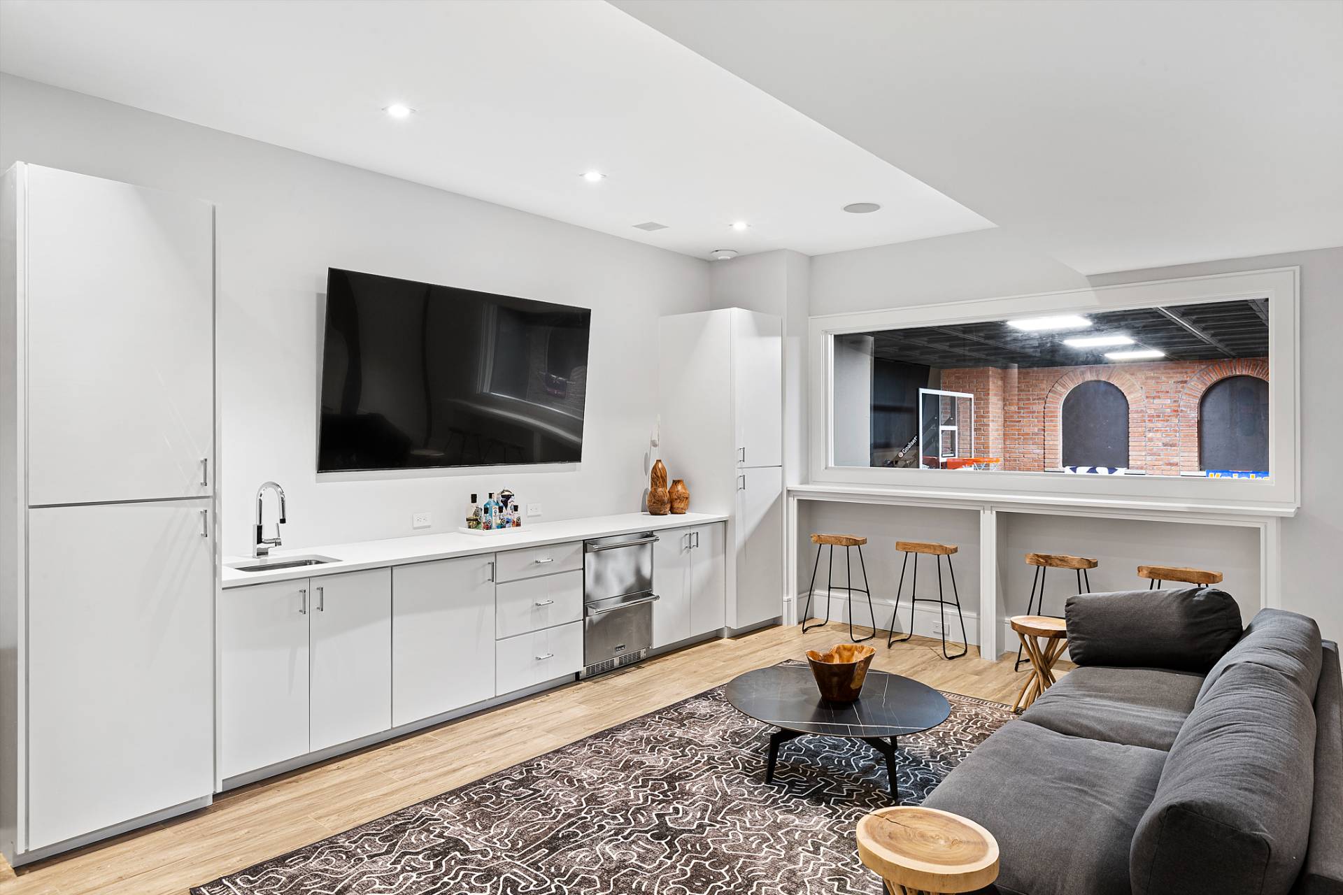 8 Crows Nest Lane East Hampton, NY 11937 - Photo 26 of 33 a living room with furniture and a flat screen tv