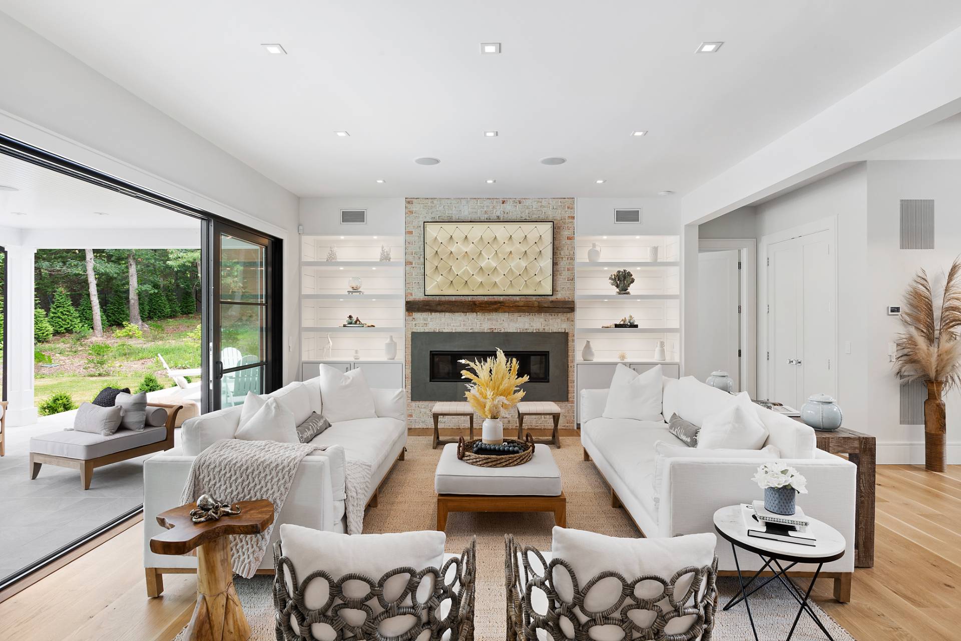 8 Crows Nest Lane East Hampton, NY 11937 - Photo 7 of 33 a living room with fireplace furniture and a large window