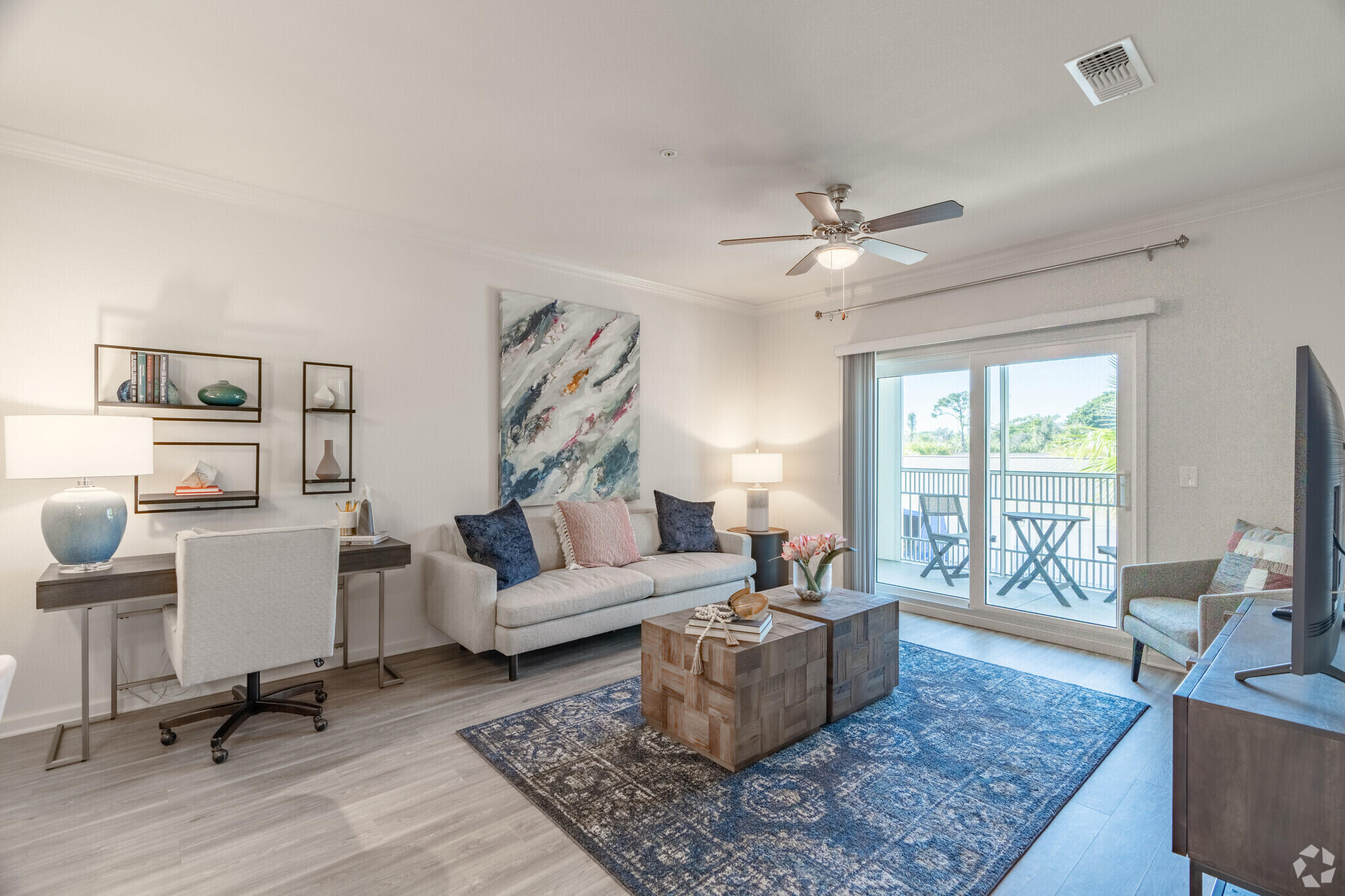 1924 Northwest Federal Highway, Unit 1305 Stuart, FL 34994 - Photo 5 of 15 a living room with furniture and a large window