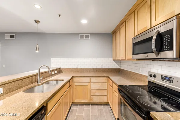 $315,000 | 4704 East Paradise Village Parkway North, Unit 211, Phoenix, AZ 85032