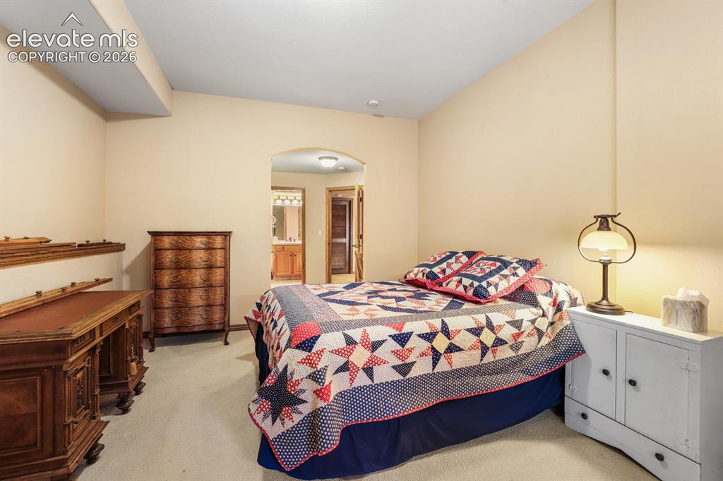 17990 Sawmill Road Colorado Springs, CO 80908 - Photo 31 of 40 One of three bedrooms on the lower level