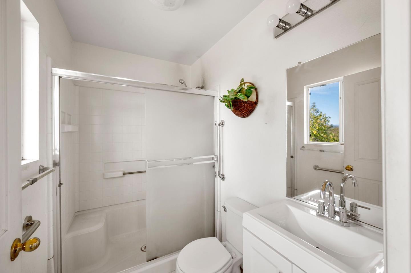 4505 4x Ranch Road Burson, CA 95225 - Photo 19 of 52 a bathroom with a sink mirror vanity and toilet