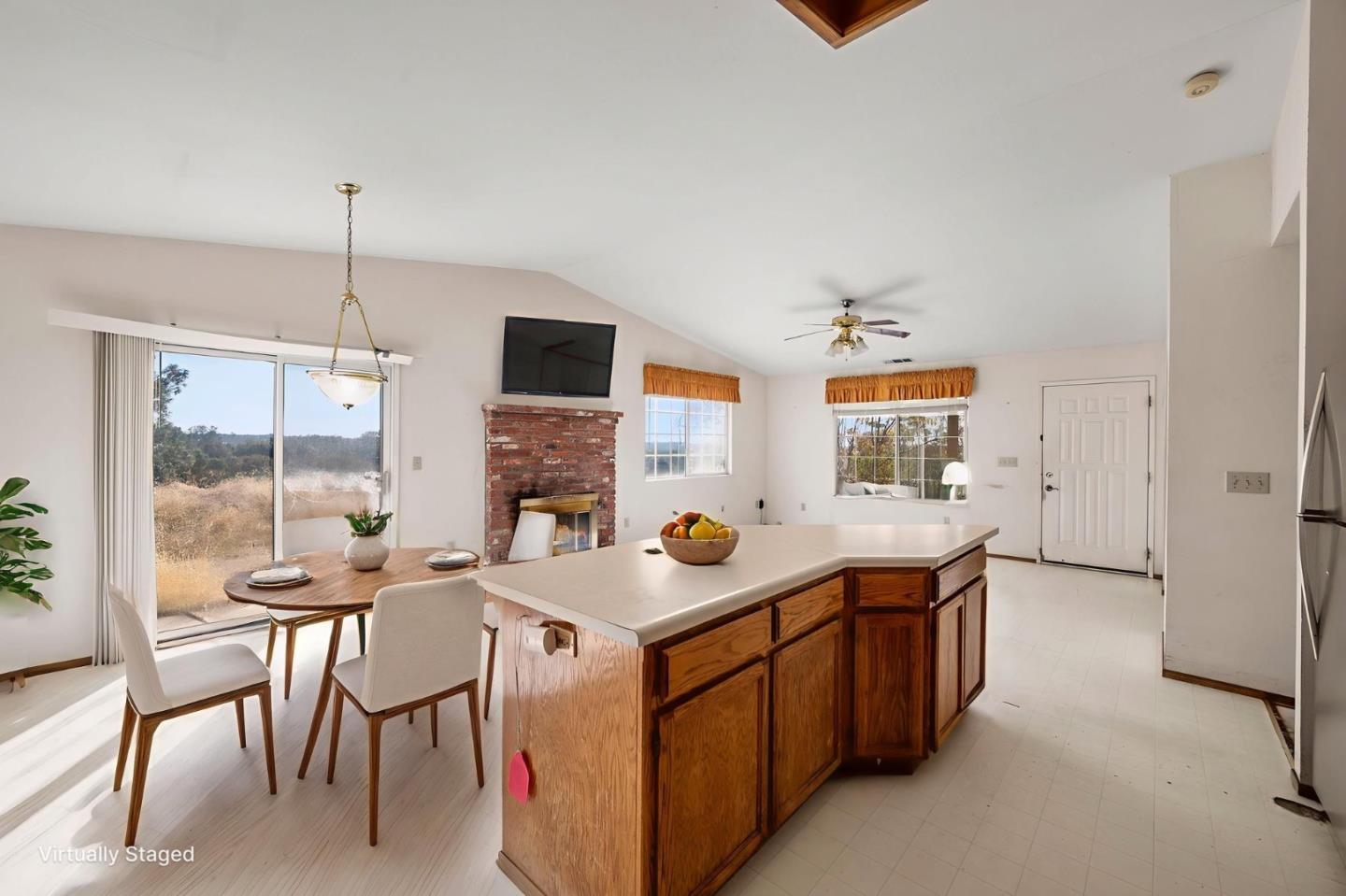 4505 4x Ranch Road Burson, CA 95225 - Photo 21 of 52 a kitchen that has a cabinets and a table in it