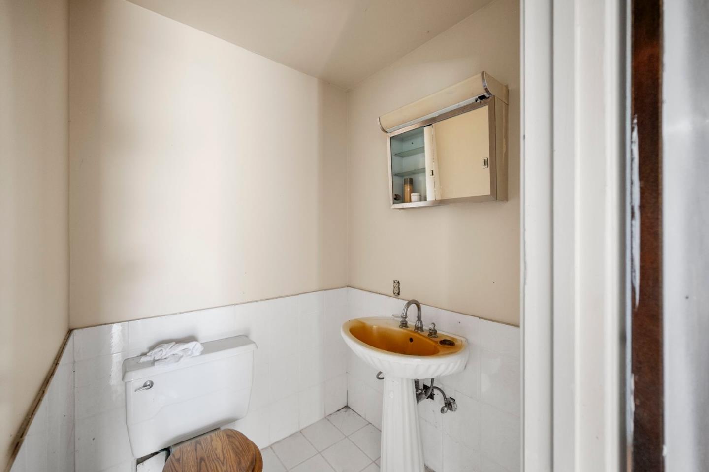 4505 4x Ranch Road Burson, CA 95225 - Photo 34 of 52 a bathroom with a sink and mirror