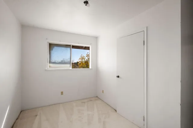 a bathroom with a sink a bathtub and a mirror