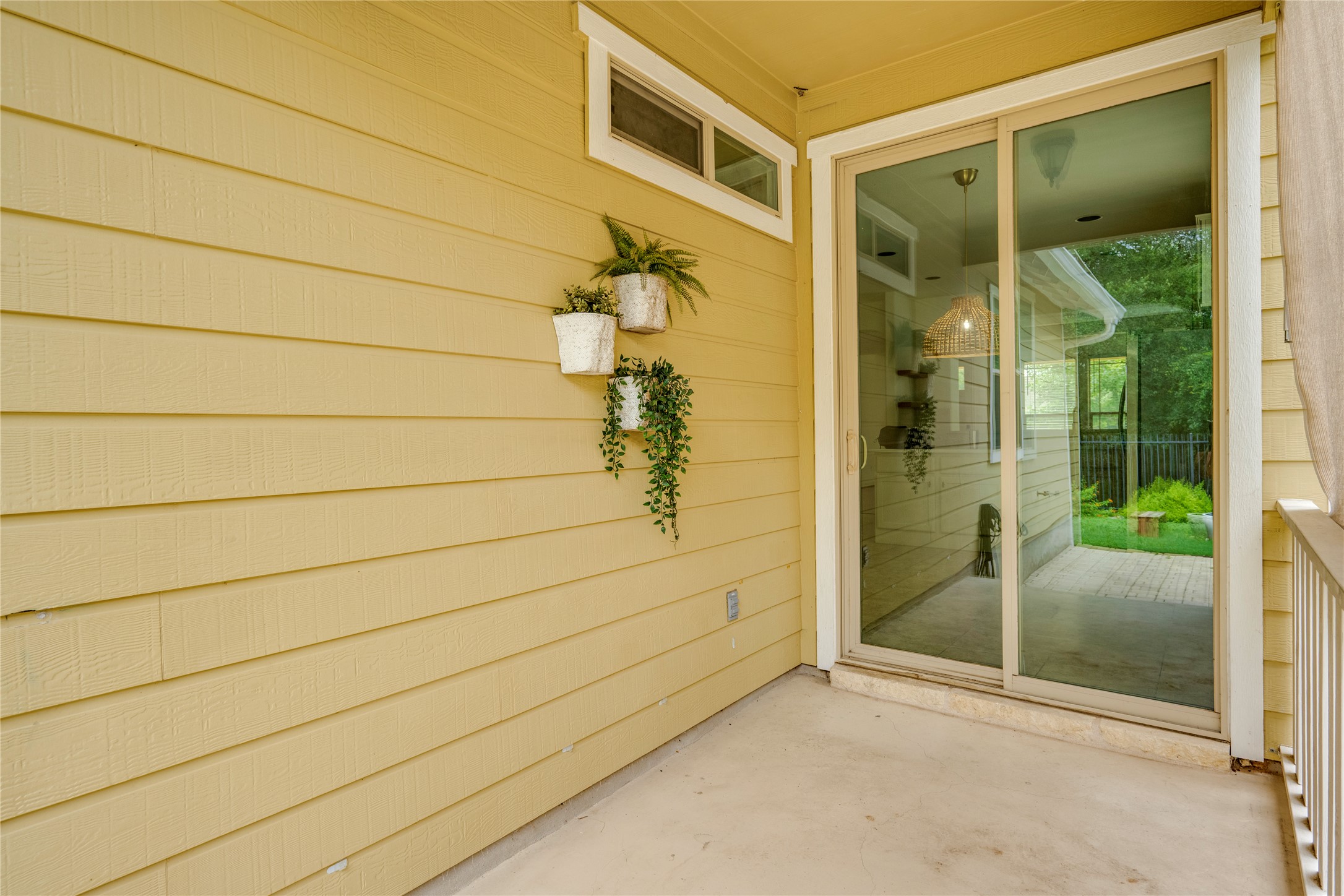 6008 Whipple Way Austin, TX 78745 - Photo 33 of 39 A private patio, ideal for peaceful moments and seamless indoor-outdoor living.