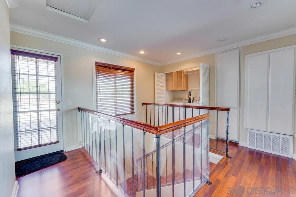 320 Grapevine Road, Unit 12 Vista, CA 92083 - Photo 23 of 50 a view of an entryway wooden floor and windows