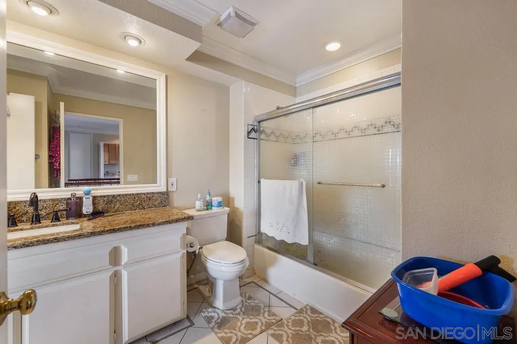 320 Grapevine Road, Unit 12 Vista, CA 92083 - Photo 29 of 50 a bathroom with a sink a toilet and shower