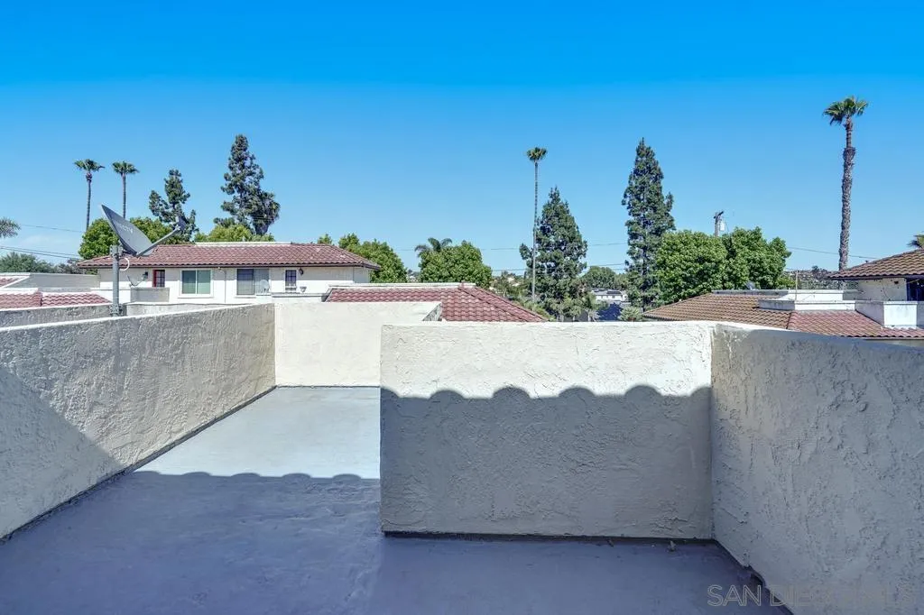 320 Grapevine Road, Unit 12 Vista, CA 92083 - Photo 32 of 50 a view of a terrace with a yard