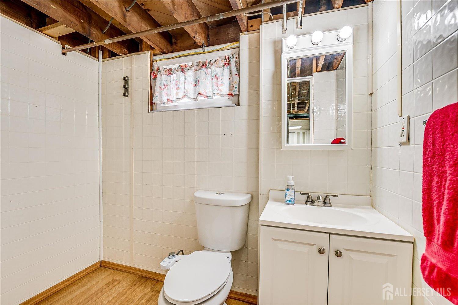 149 Vineyard Road Edison, NJ 08817 - Photo 33 of 40 a bathroom with a sink toilet and shower